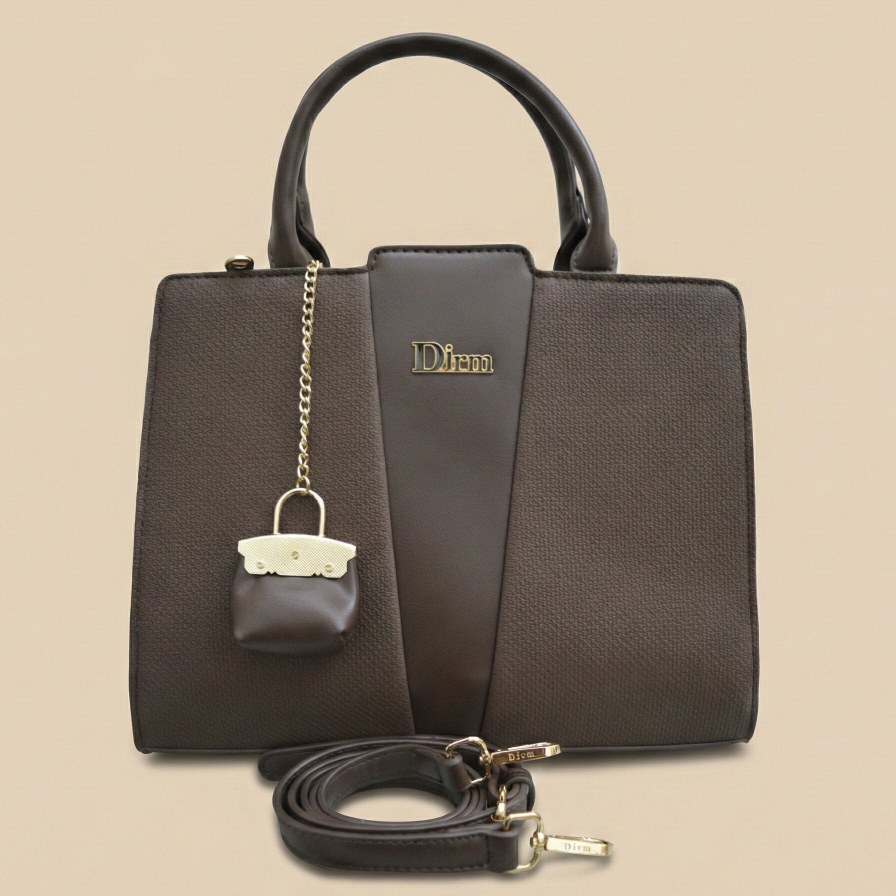 Brown handbag with matching pouch and detachable strap on a beige background