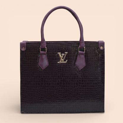 Luxury handbag with purple handles and a prominent logo on a beige background