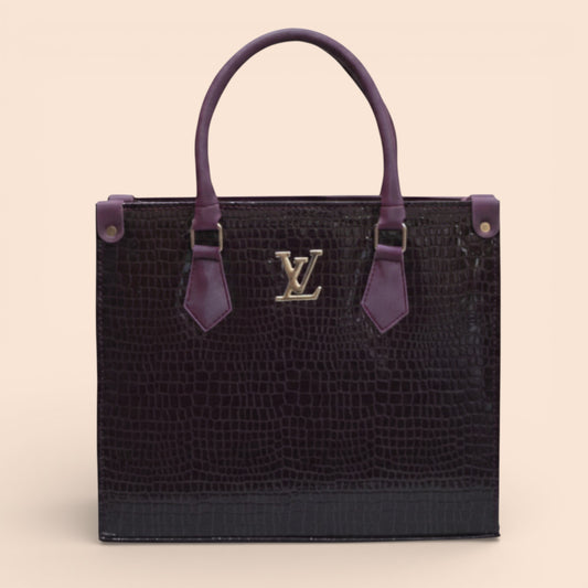 Luxury handbag with purple handles and a prominent logo on a beige background