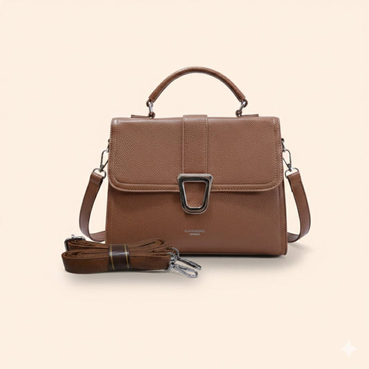 Brown leather handbag with a strap on a beige background